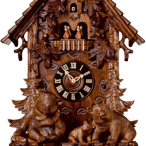 Carved 8-day musical cuckoo clock with chalet roof and carved facade,  family of bears, fir trees, and dancers 92cm by Hönes